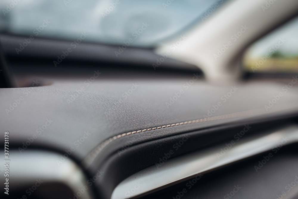 Modern supercar leather panel close up