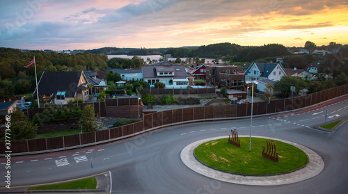 Dynamic Sunset over Quite norweigan town next to Stokkavannet lake and Madla Shopping Center  in Stavanger Norway photo