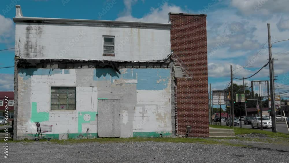 Abandoned Store Buildings on the corner of busy street Abandoned Store Buildings on the corner of busy street