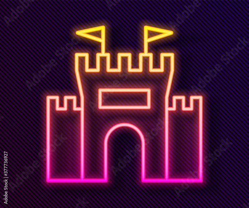 Glowing neon line Castle icon isolated on black background. Vector.