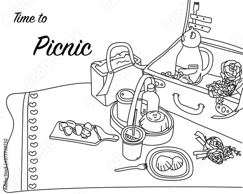 Picnic time with picnic basket, drink and dessert