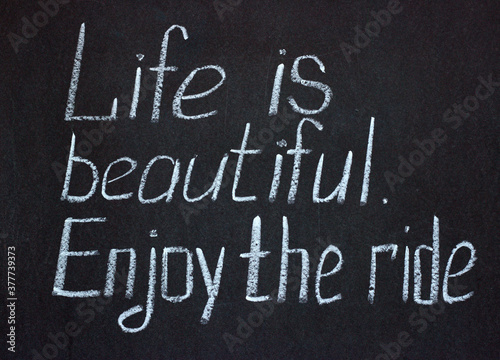 Cuadro en lienzo Chalkboard lettering Life is beautiful. Enjoy the ride