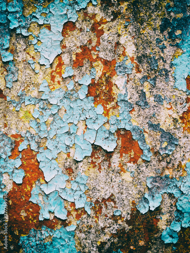 background old concrete wall with cracked peeling  paint, texture, grunge, multicolored