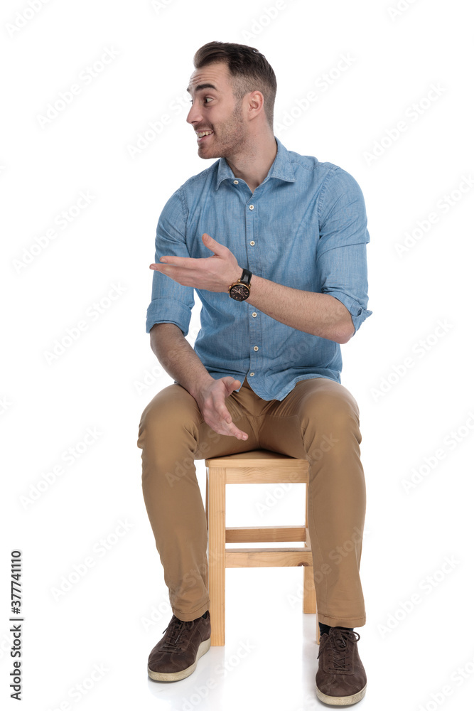 Friendly smart casual man gesturing and talking, smiling Friendly smart casual man gesturing and talking, smiling