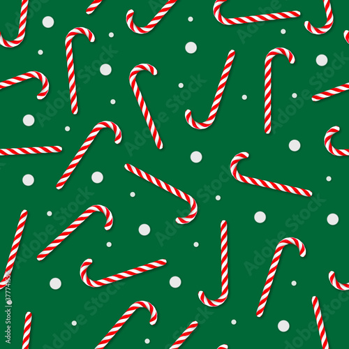 Seamless texture of red and white candy cane on green background with whitepoints. 3D rendering and 3D illustration.