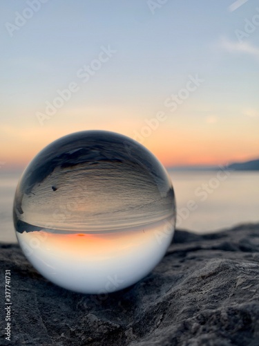sunset reflection in a crystal ball