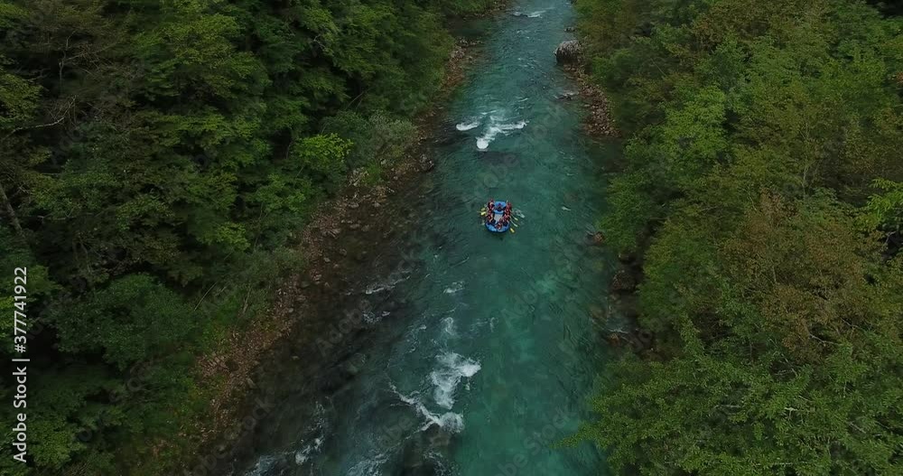 Aerial shot of people on whitewater rafting on beautiful river Aerial shot of people on whitewater rafting on beautiful river