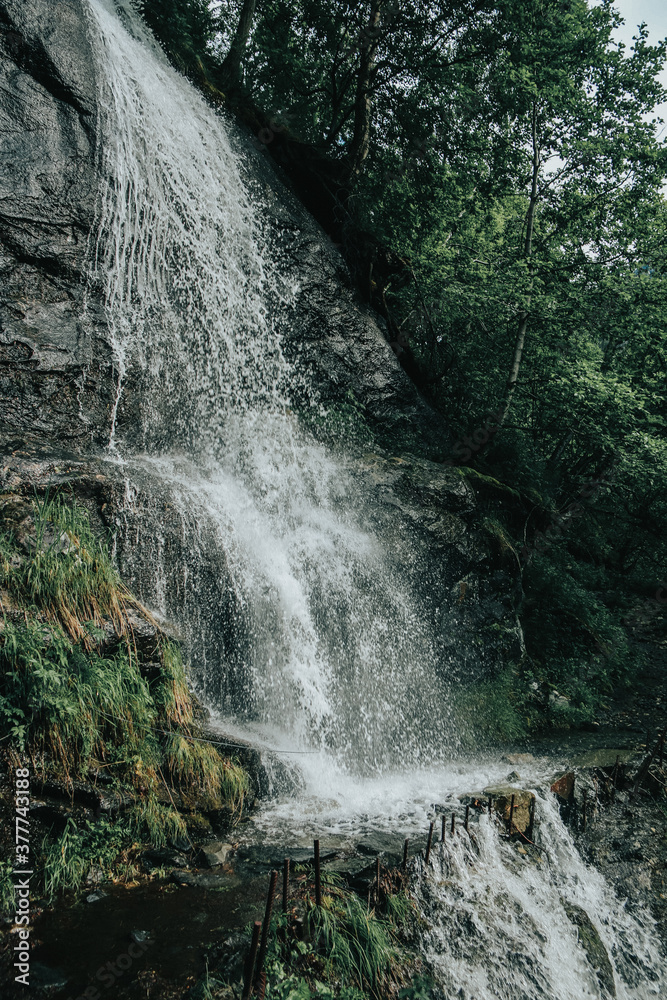 Fototapeta premium waterfall on the norwegian mountain