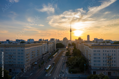 Strausberger Platz in Berlin by sunset wiht the Television Tower in the background. photo