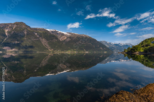 Fototapeta Naklejka Na Ścianę i Meble -  Breathtaking landscapes along the Hardanger fjord and its inner branches, in the traditional Hardanger district of Vestland in Norway.