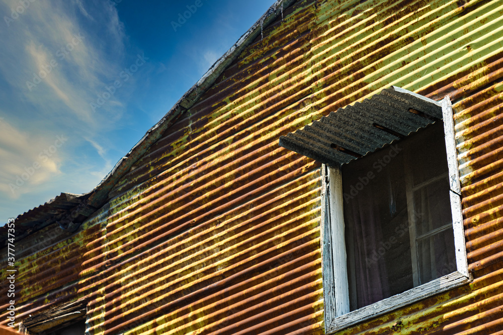 Window in a shack made of corrugated sheets in the Caminito area, in the Buenos Aires neighborhood of La Boca Window in a shack made of corrugated sheets in the Caminito area, in the Buenos Aires neighborhood of La Boca