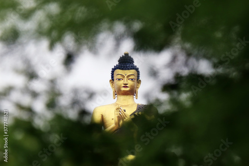 Buddha Park of Ravangla. Beautiful huge statue of Lord Buddha, at Rabangla, Sikkim, India. Gautam Buddha statue in the Buddha Park of Ravangla in South Sikkim. Frame within a frame concept.