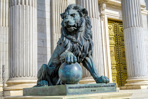 Parliament facade columns and lion in Madrid, Spain. Congreso diputados