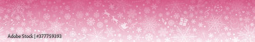 Christmas banner of various snowflakes and holiday symbols, in pink colors