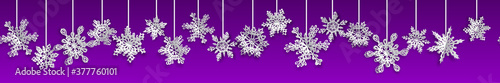 Christmas seamless banner with volume paper snowflakes with soft shadows on purple background. With horizontal repetition