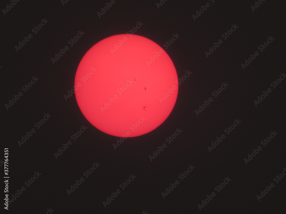 Red Sun In Smoky Sky
