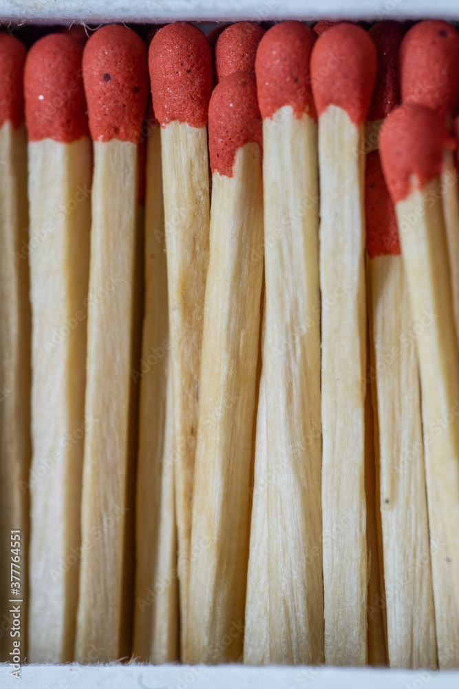 Close-up of matches inside a matchbox