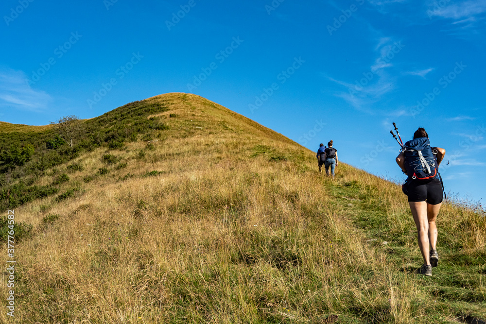 Trekking scene in Lake Como alps at sunset