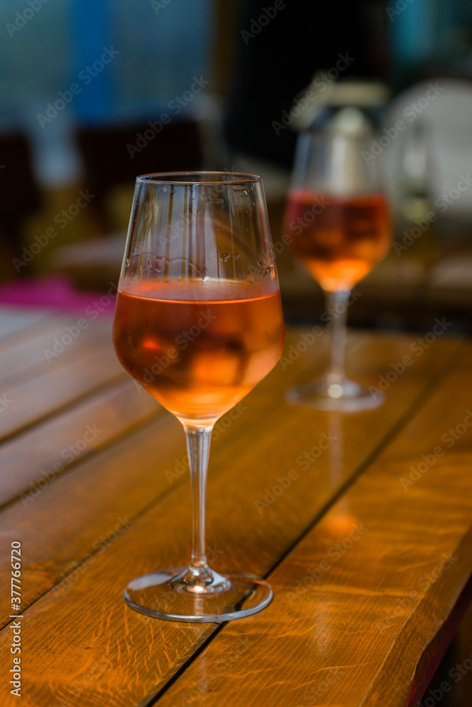 Two glasses with rose wine dewy. Two glasses with rose wine dewy.