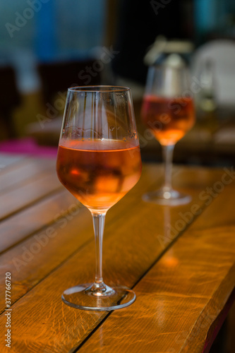 Two glasses with rose wine dewy.