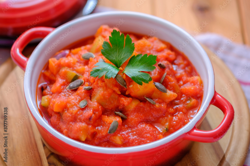 Vegetable stew in a beautiful red saucepan. Vegetable stew in a beautiful red saucepan.