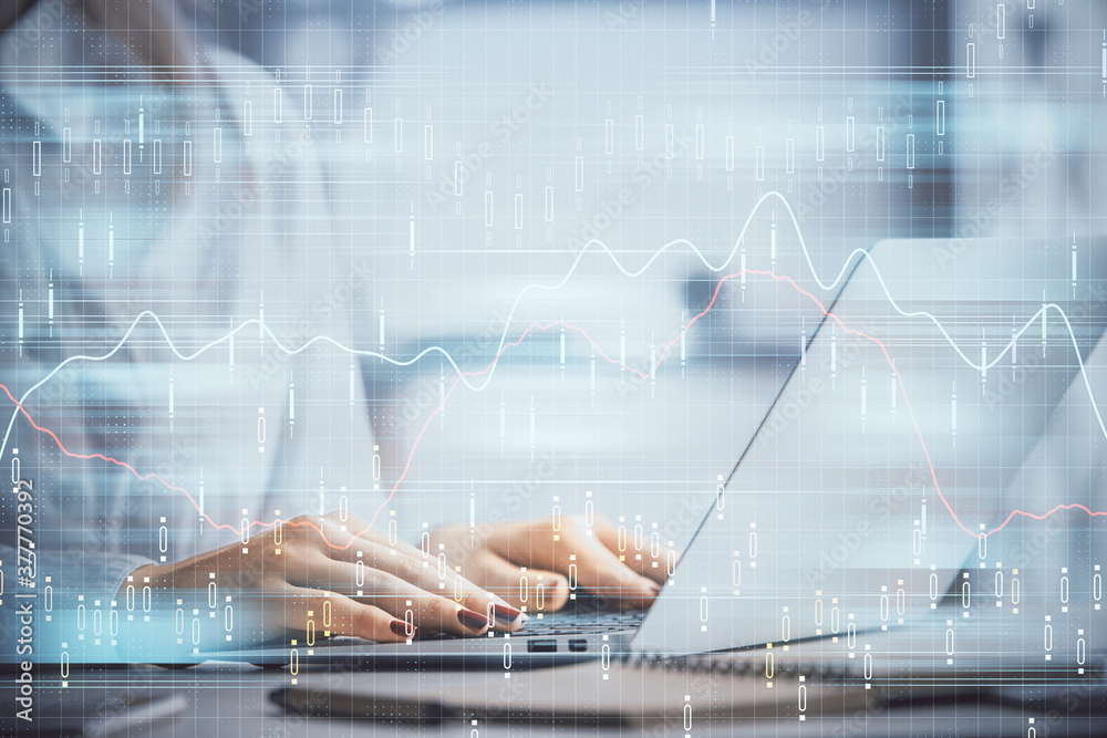Double exposure of woman hands working on computer and forex graph hologram drawing. Financial analysis concept. Double exposure of woman hands working on computer and forex graph hologram drawing. Financial analysis concept.