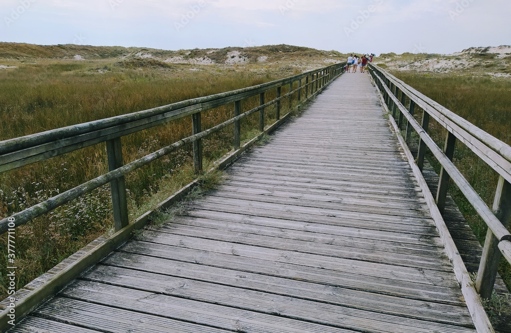 wooden bridge to the beach