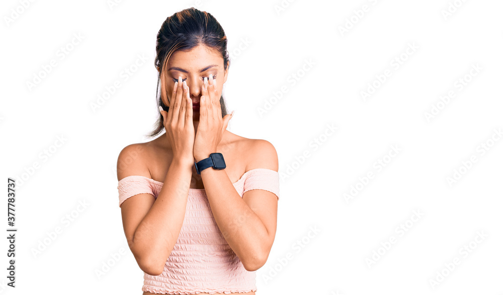 Young beautiful woman wearing casual clothes rubbing eyes for fatigue and headache, sleepy and tired expression. vision problem Young beautiful woman wearing casual clothes rubbing eyes for fatigue and headache, sleepy and tired expression. vision problem