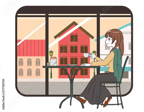 カフェで過ごす女性　スカート　町並み窓枠付き