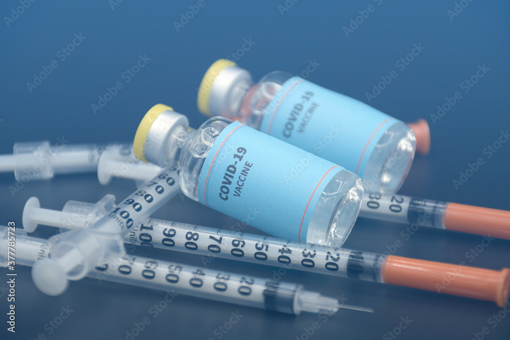 Sample of COVID-19 vaccine on black background. Sample of COVID-19 vaccine on black background.