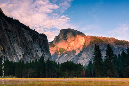 Yosemite half dome from the valley at sunset photo