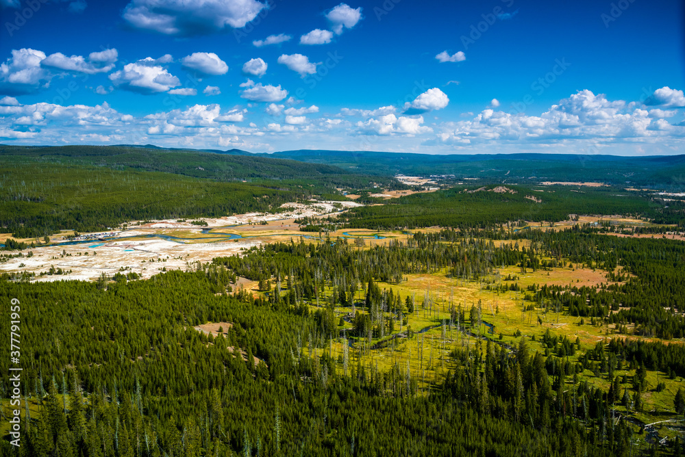 Panoramic view of Yellowstone upper and lower geyser bassin and the Firehole river valley