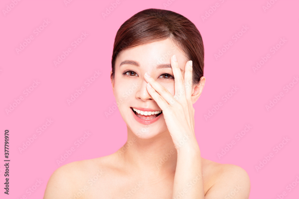 Close up of happy young woman's face with clean perfect skin Close up of happy young woman's face with clean perfect skin