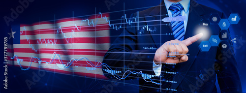 Businessman touching data analytics process system with KPI financial charts, dashboard of stock and marketing on virtual interface. With Liberia flag in background. © TexBr