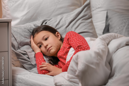 Little girl suffering from sleep disorder in bedroom © Pixel-Shot