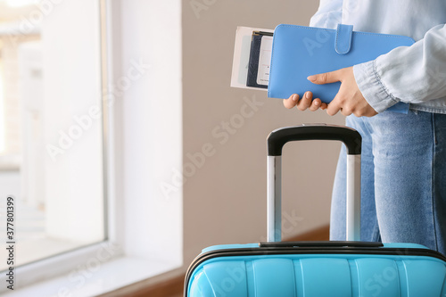 Woman with travel organizer...
