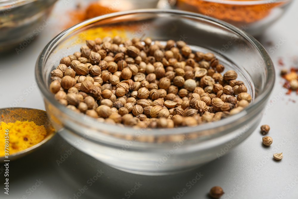 Bowl with aromatic coriander on table, closeup Bowl with aromatic coriander on table, closeup