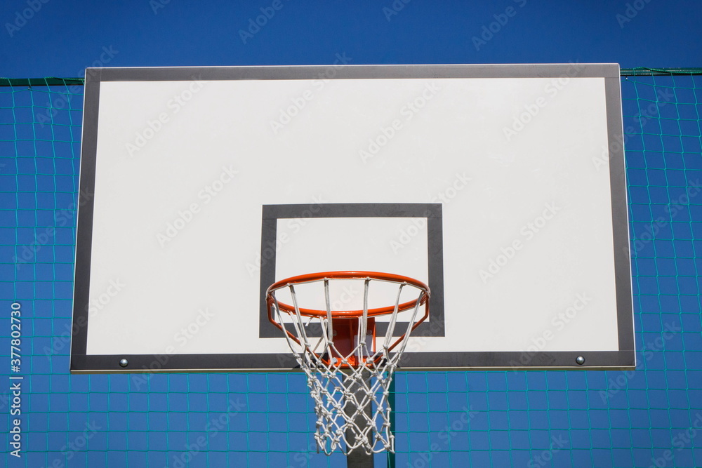 Basketball board with hoop. Sport and recreation time