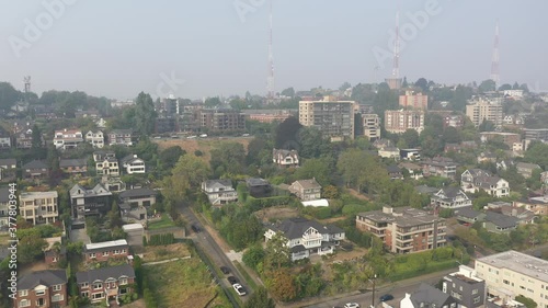 Aerial / drone footage of the Queen Anne neighborhood with smoke in the air from the Washington State wildfires in Seattle, Washington photo