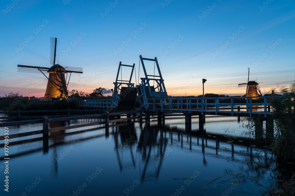 The wind mills of Kinderdijk with a drawbridge