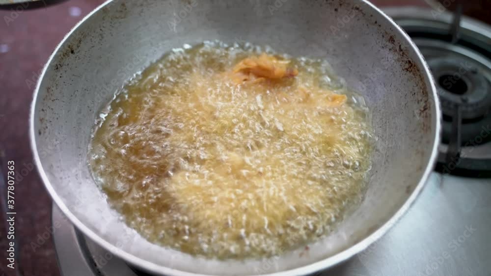 Mixed Onion Pakoda Recipe Deep Fried On A Frying Pan With Boiling Cooking Oil. - Close Up Shot Mixed Onion Pakoda Recipe Deep Fried On A Frying Pan With Boiling Cooking Oil. - Close Up Shot
