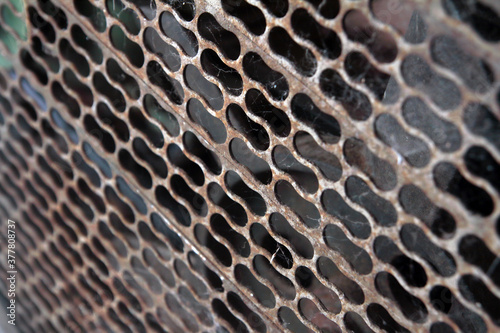 Old rustic metal iron grill © V.R.Murralinath