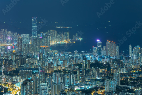Aerial view of Hong Kong city at night © leeyiutung