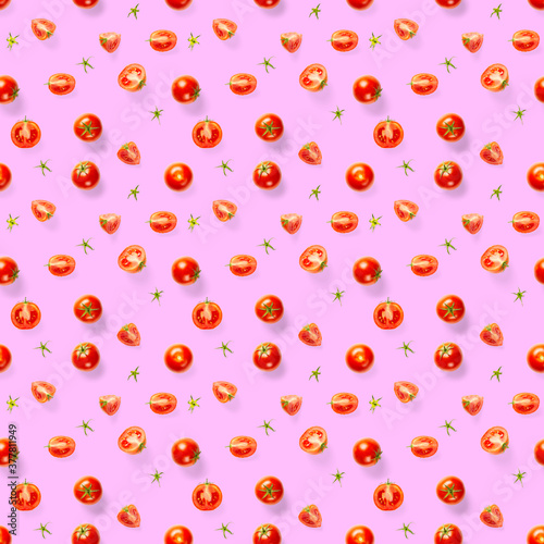 Fototapeta Naklejka Na Ścianę i Meble -  Seamless pattern with red ripe tomatoes. Tomato isolated on rose background. Vegetable abstract seamless pattern. Organic Tomatoes flat lay