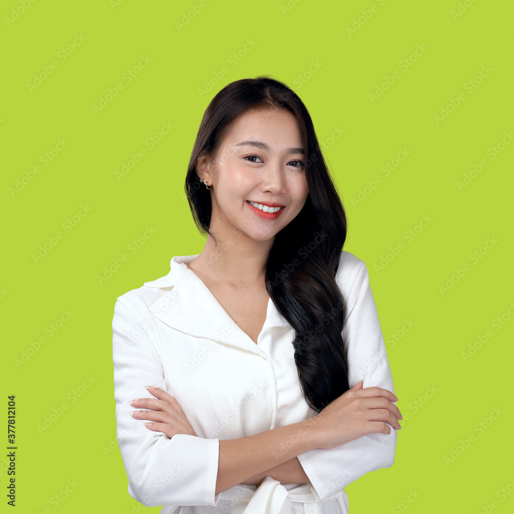 Asian business woman looks smart for marketing teams, Business casual outfit, isolated with green background Asian business woman looks smart for marketing teams, Business casual outfit, isolated with green background