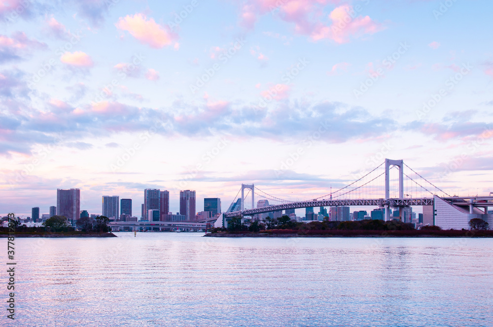 Odaiba Rainbow bridge with Tokyo bay view at evening sunset sky