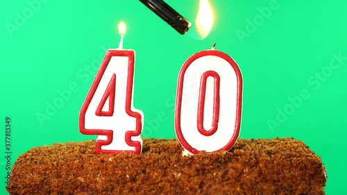 Cake with the number 40 lighted candle. Chroma key. Green Screen. Isolated