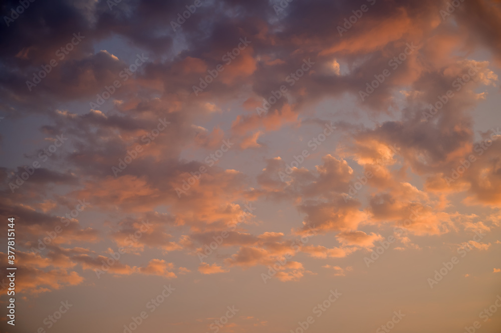 Beautiful colorful sky with clouds and sunlight. Color toned.
