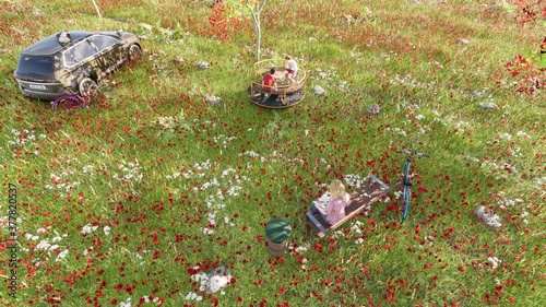 Children play on the carousel on the playground