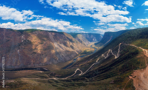 Panorama of the Katu Yaryk mountain pass and the valley of the river of Chulyshman. Altai Republic, Russia, beautiful summer day